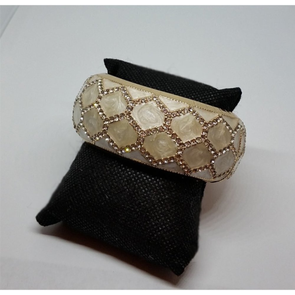 Dazzling sparkling gold tone with cream enamel clamp hinge bracelet dressy